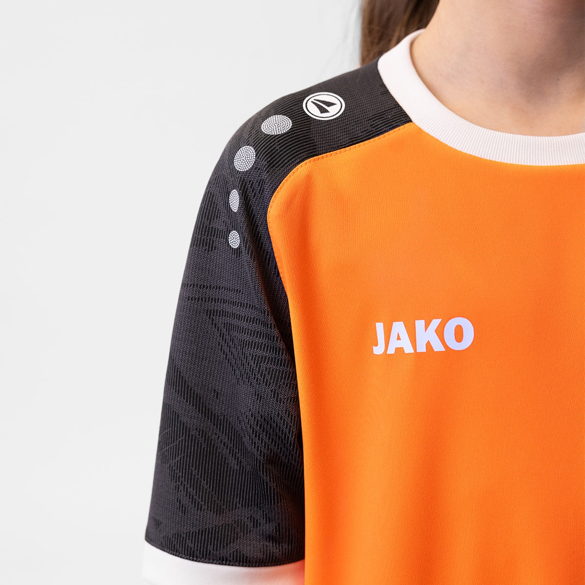 JAKO Trikot Iconic KA neonorange/schwarz