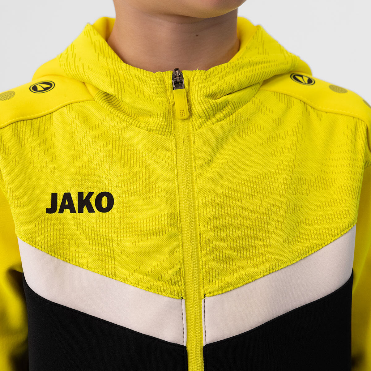 JAKO Kapuzenjacke Iconic 6824 schwarz/soft yellow