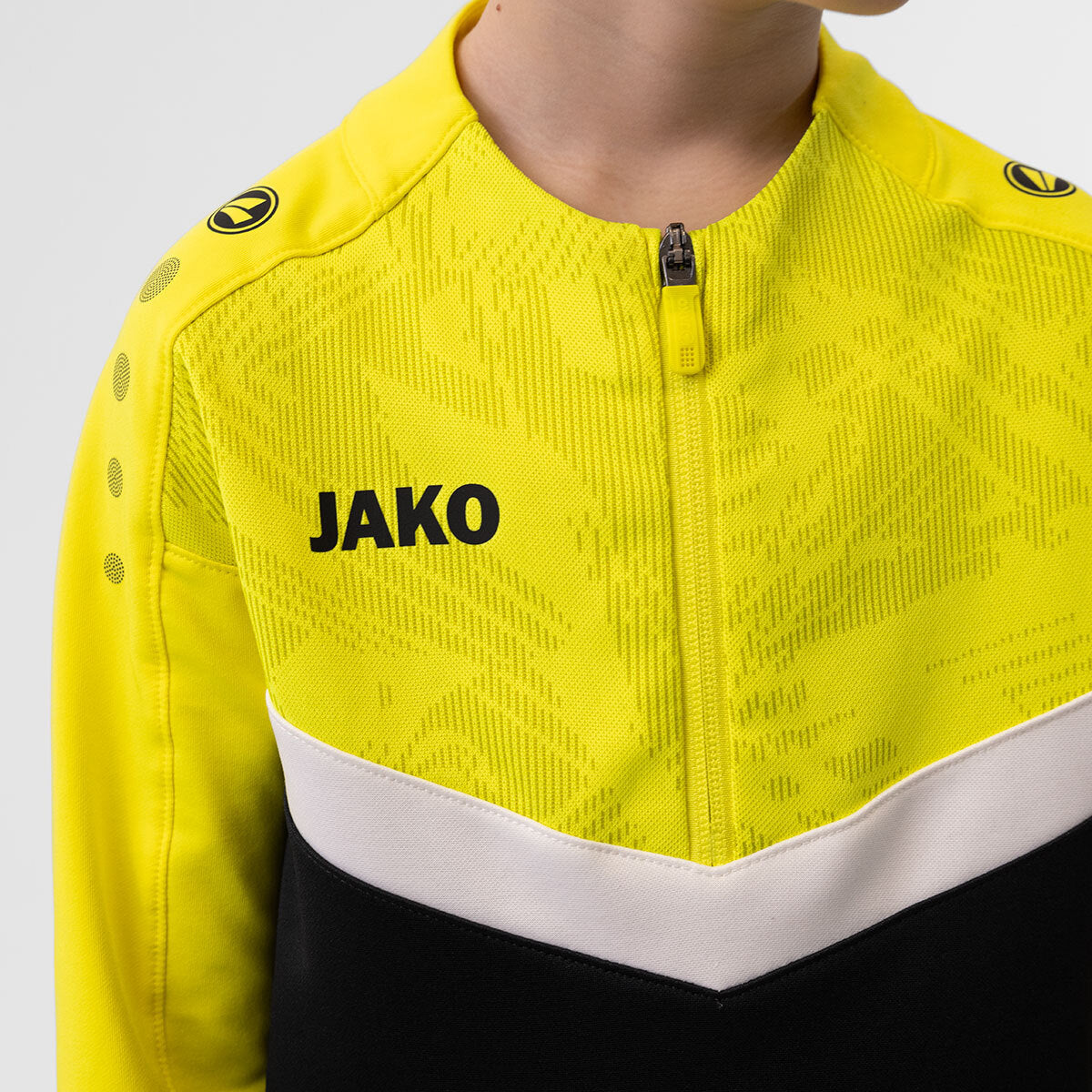 JAKO Ziptop Iconic 8624 schwarz/soft yellow