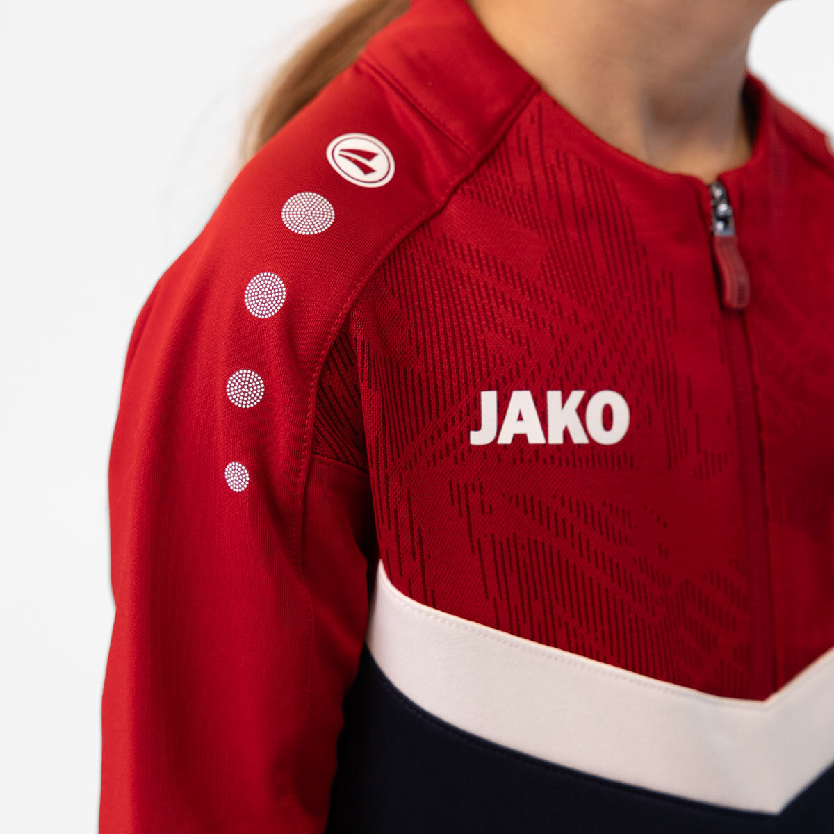JAKO Ziptop Iconic 8624 marine/chili rot