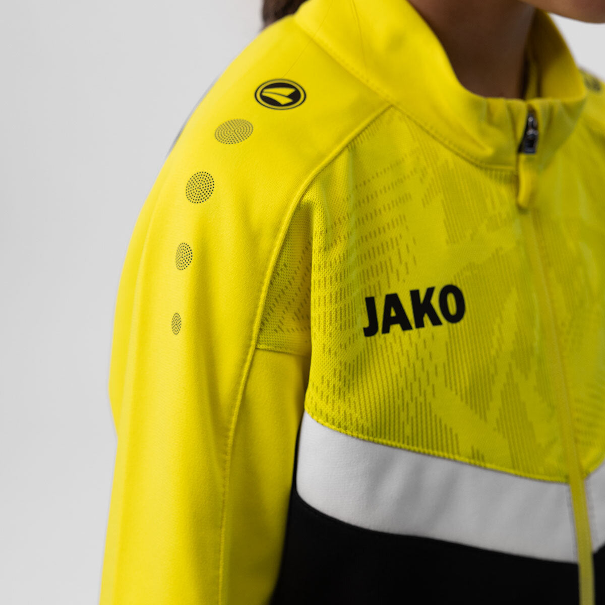 JAKO Polyesterjacke Iconic 9324 schwarz/soft yellow