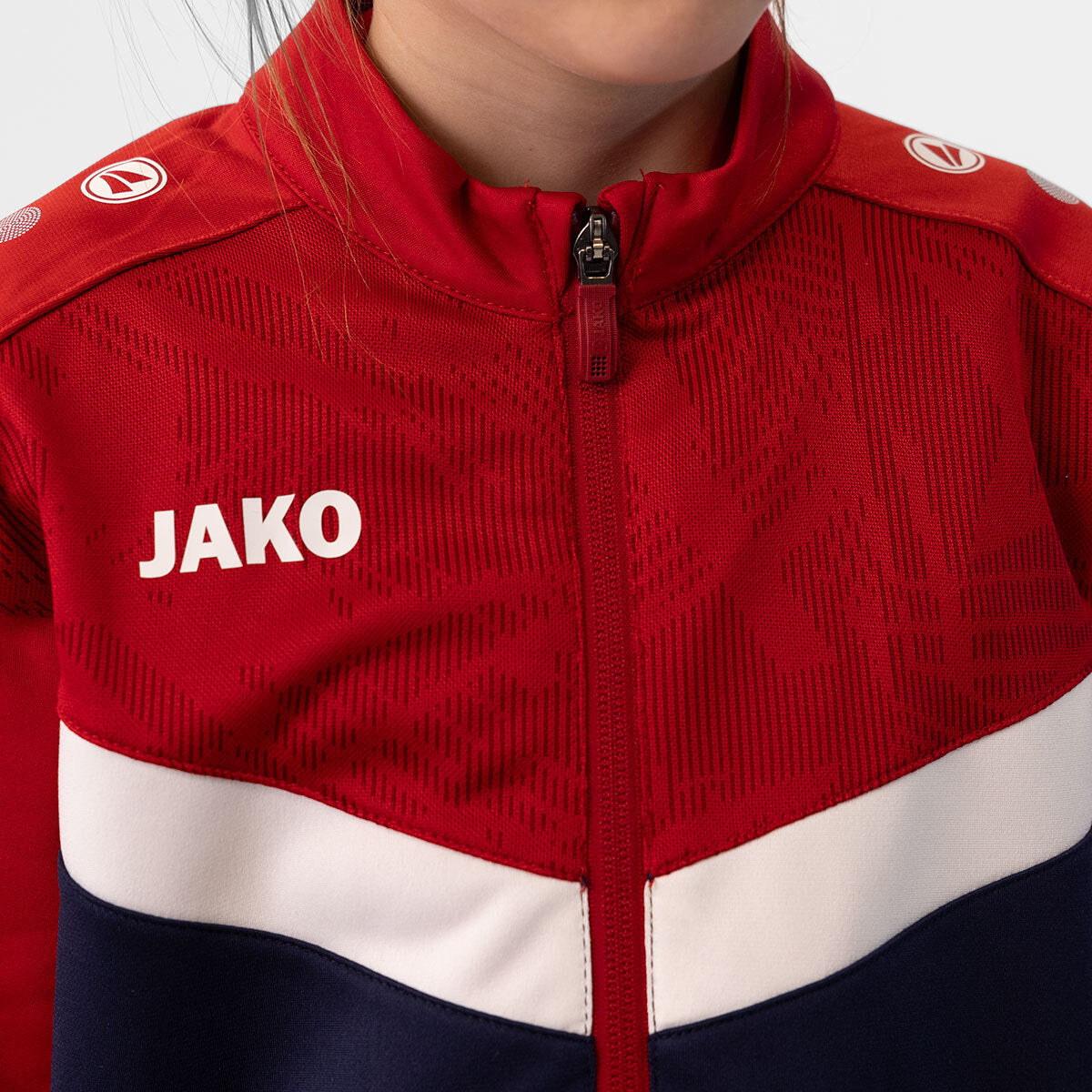JAKO Polyesterjacke Iconic 9324 marine/chili rot