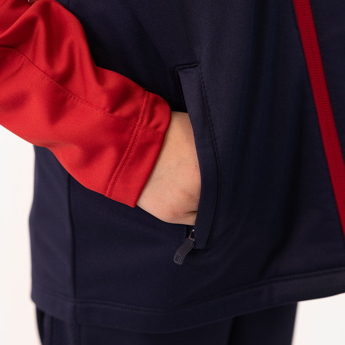 JAKO Polyesterjacke Iconic 9324 marine/chili rot