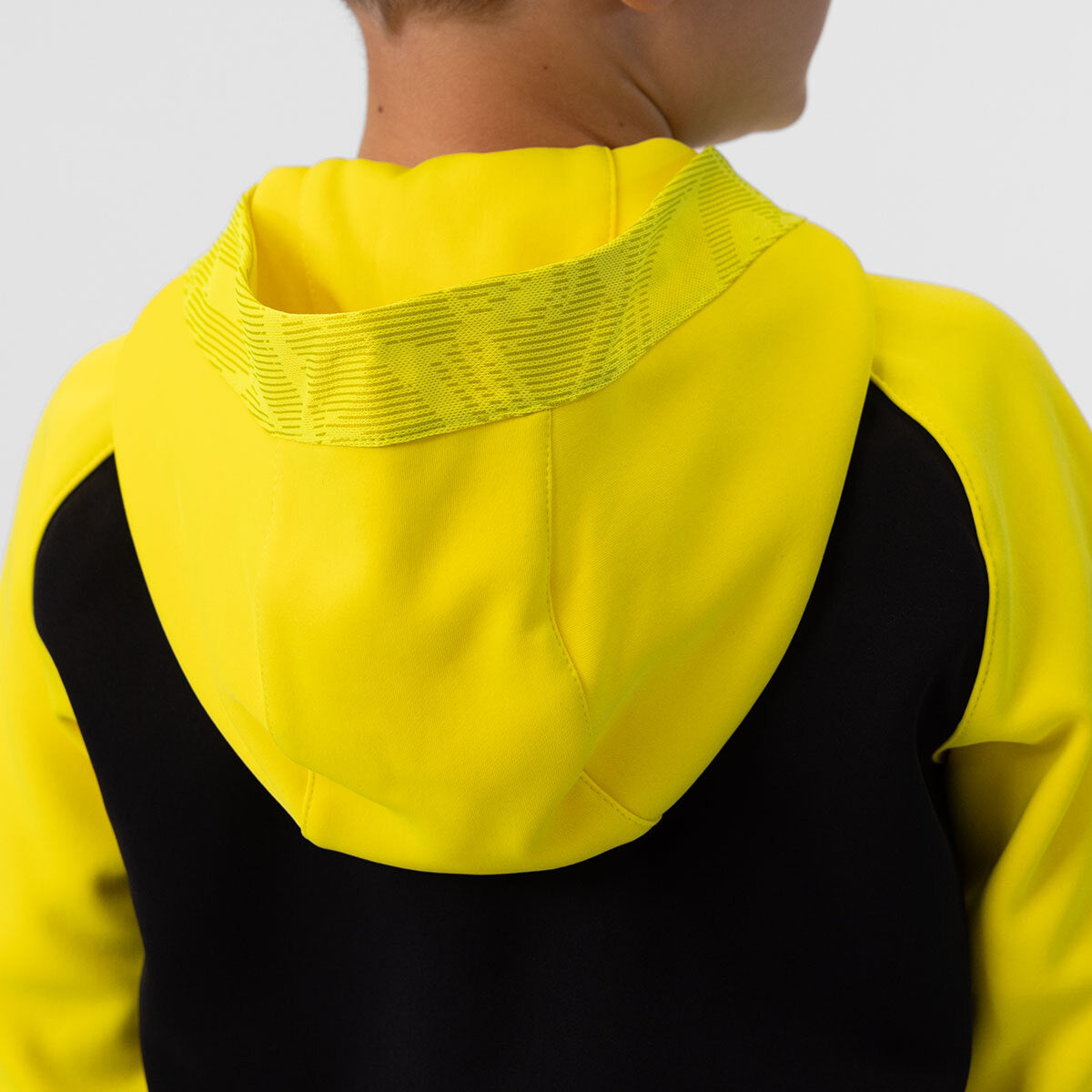 JAKO Kapuzenjacke Iconic 6824 schwarz/soft yellow